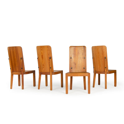 A Set of Four Pine High Back Dining Chairs by Axel Einar Hjorth for Nordiska Kompaniet