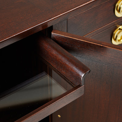 Modernist sideboard cabinet with unique bronze hardware. by Edward Wormley for Dunbar