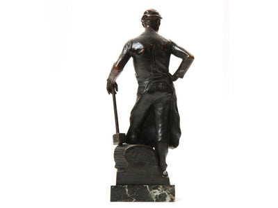 Sculpture of Standing Blacksmith by Adolf Joseph Phol