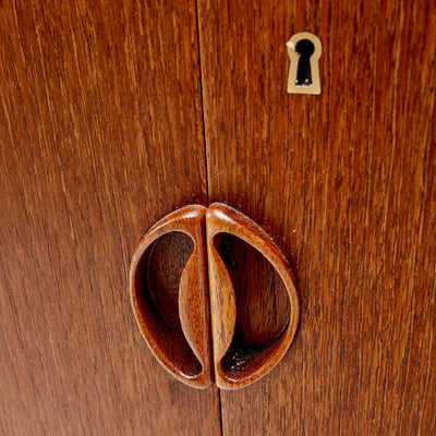 A Solid Teak Two Door Storage Cabinet by Peter Hvidt & Orla Mölgaard-Nielsen - WYETH