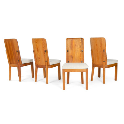 A Set of Four Pine High Back Dining Chairs by Axel Einar Hjorth for Nordiska Kompaniet